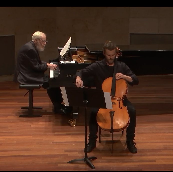 Scott Thompson performing cello with a pianist